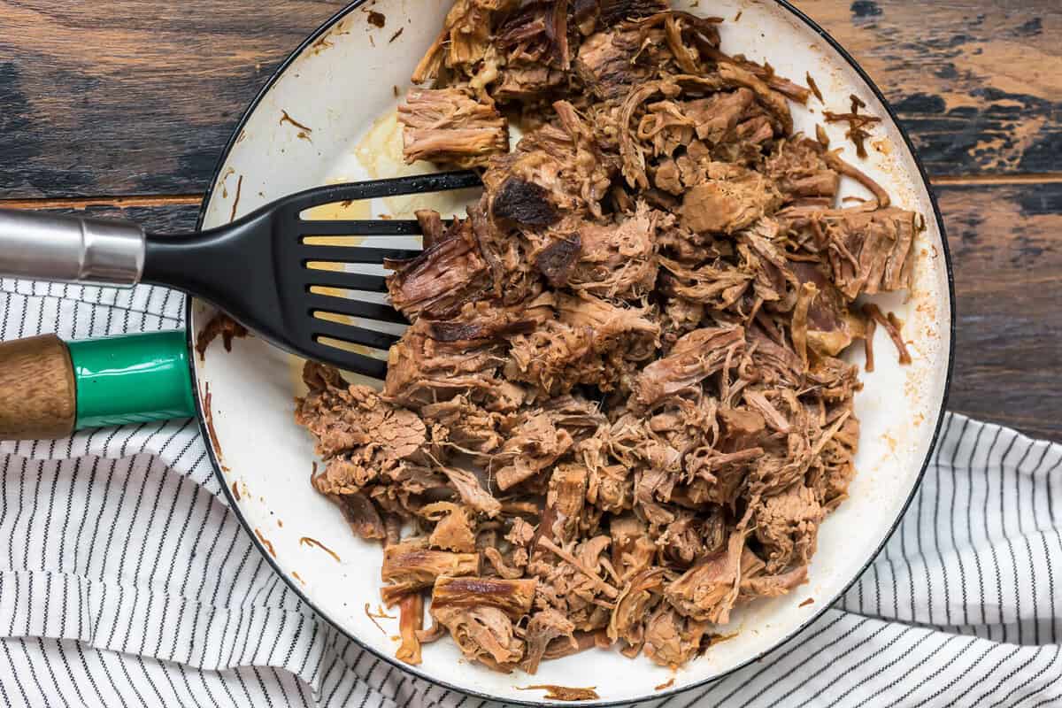 Open-faced roast beef sandwich with pulled pork.