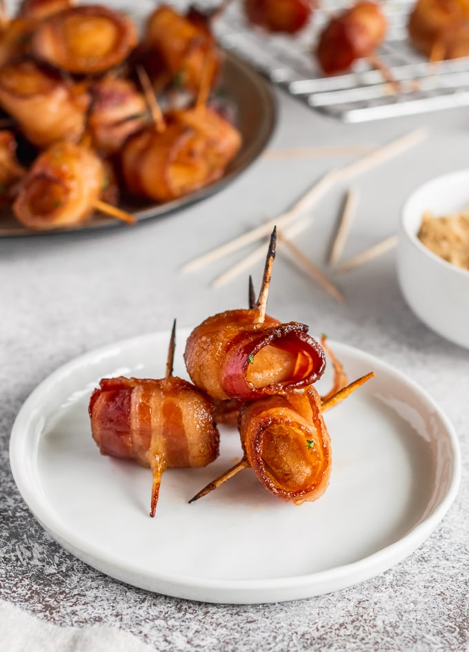 three water chestnuts wrapped in bacon