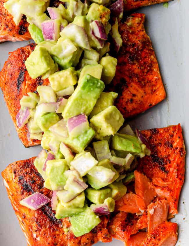 platter of grilled salmon with avocado salsa