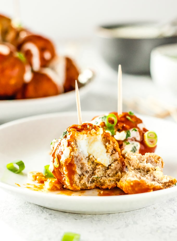 blue cheese stuffed buffalo chicken meatballs on a plate