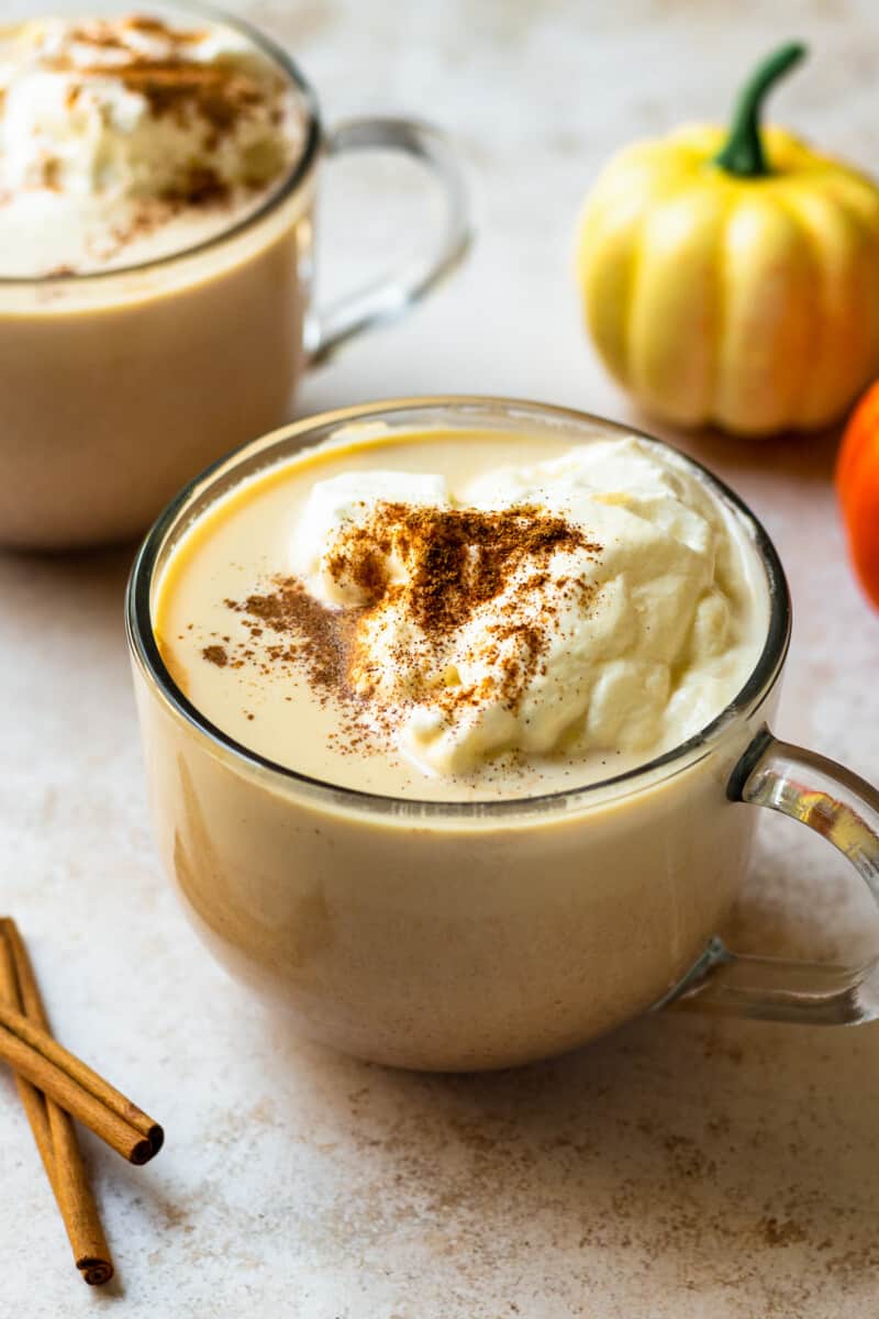 overhead hot pumpkin cocktail in mug with whipped cream