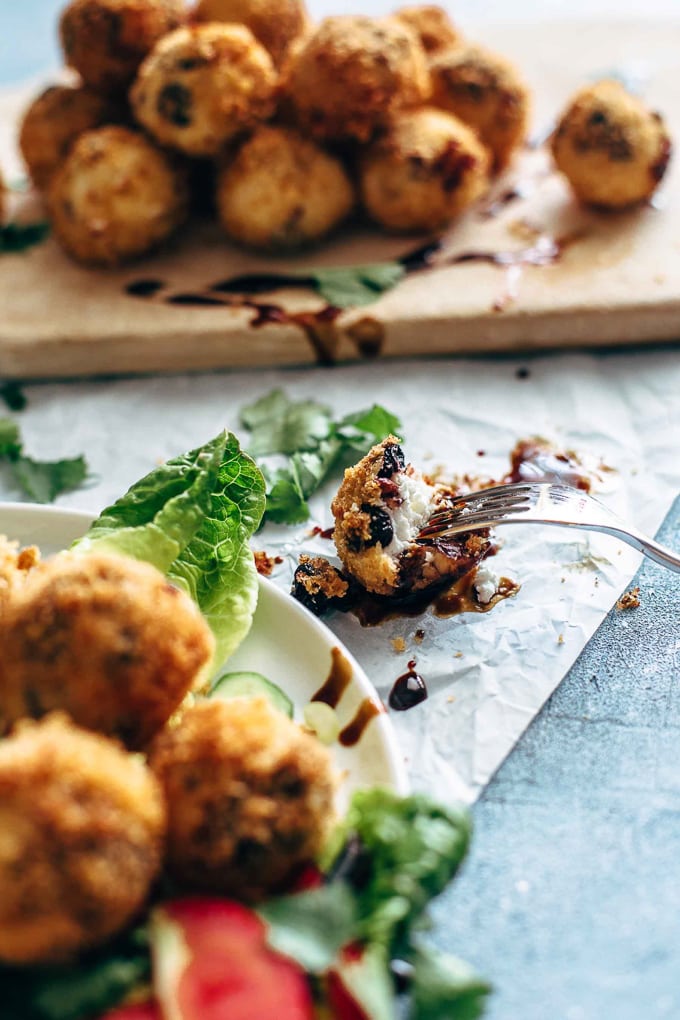 Fried Goat Cheese Appetizer filled with dried cranberries and pecans