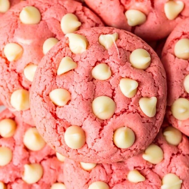 Strawberry Cookies are my favorite Strawberry Cake Mix Cookies! These White Chocolate Strawberry Cake Mix Cookies are so fun and delicious, and so super easy! Fun, festive, and SUPER SIMPLE! Strawberry Cookies with White Chocolate Chips are the perfect Pink Cookies for Valentine's Day, Easter, baby and wedding showers, and beyond! This Cake Mix Cookies Recipe will blow your mind.