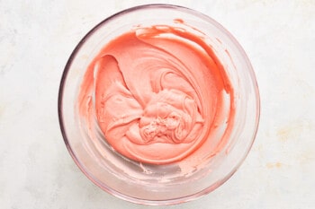 strawberry donut batter in a glass bowl.