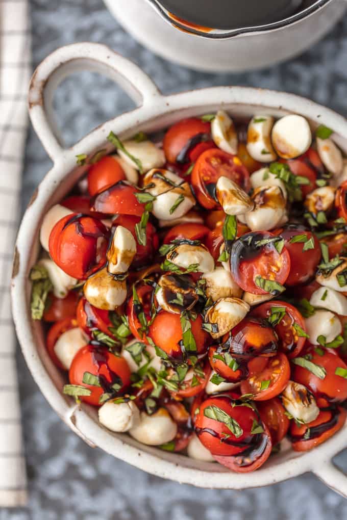 chopped tomatoes and mozzarella tossed into a salad