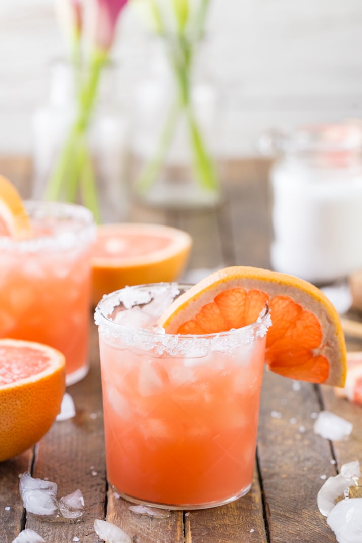 cocktail garnished with salted rim and slice of grapefruit