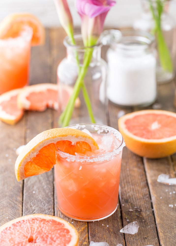 cocktail with grapefruit slices around it