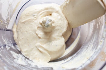 goat cheese dip in the bowl of a food processor.