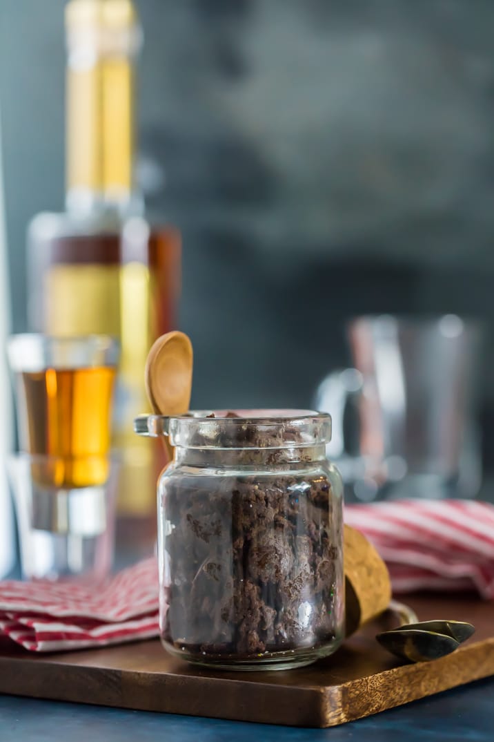 A cup of coffee on a table, with Butter and Chocolate