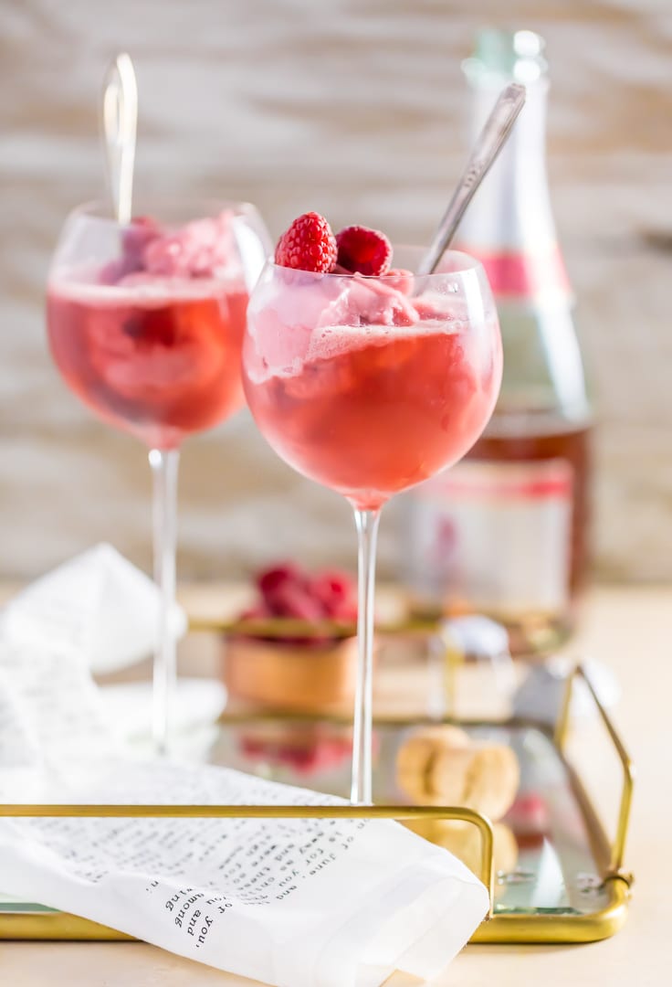 two glasses of raspberry champagne floats