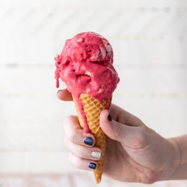 Red Velvet Ice Cream is one of my favorite homemade ice cream recipes. This cream cheese ice cream is the perfect mix of red velvet flavor and cream cheese icing. This easy homemade ice cream recipe makes a delicious Valentine's Day dessert!