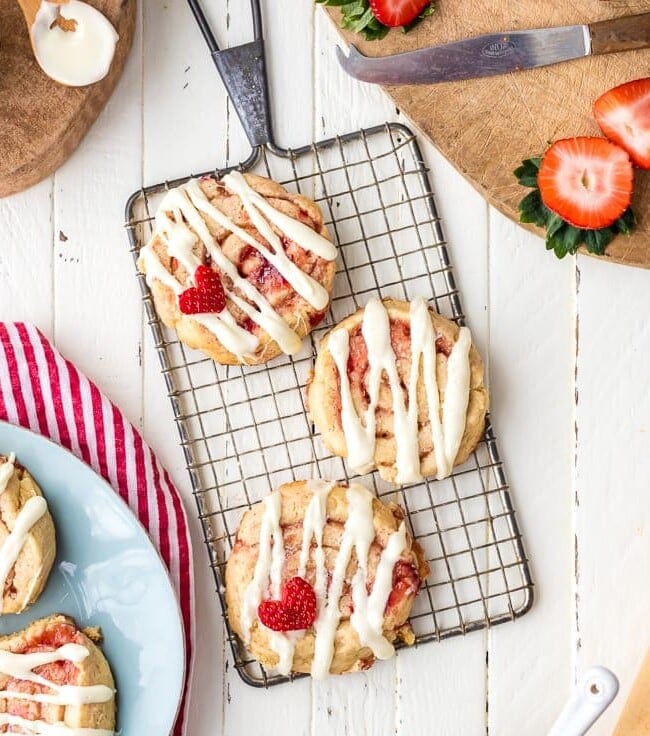 Strawberry Cinnamon Roll Cookies are the perfect Valentine's Day cookies! This easy cookies recipe is sweet, fun, and perfect for any loved one.