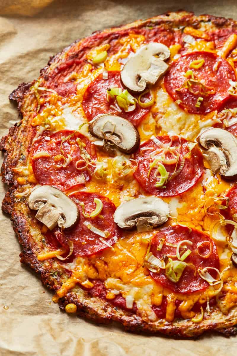 up close image of pizza with cauliflower pizza crust