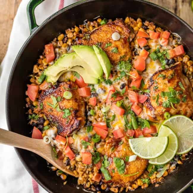 ONE PAN BBQ RANCH CHICKEN SKILLET, the perfect easy recipe for families! Best weeknight meal packed with cheese, corn, beans, chicken, cilantro, RANCH, and bbq sauce! MADE IN ONE POT!