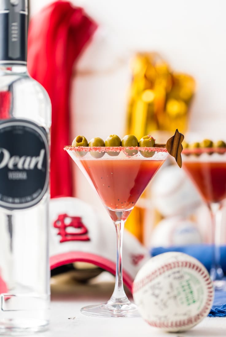 red martini with olives