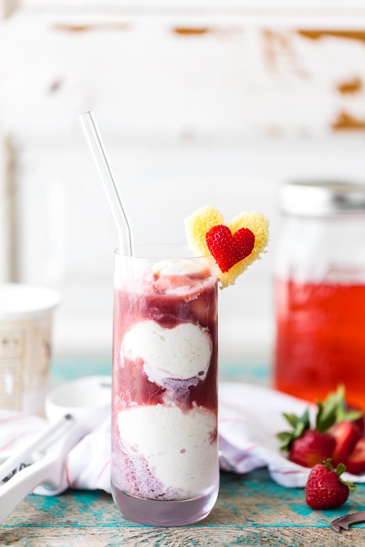 strawberry shortcake vodka float in a tall glass