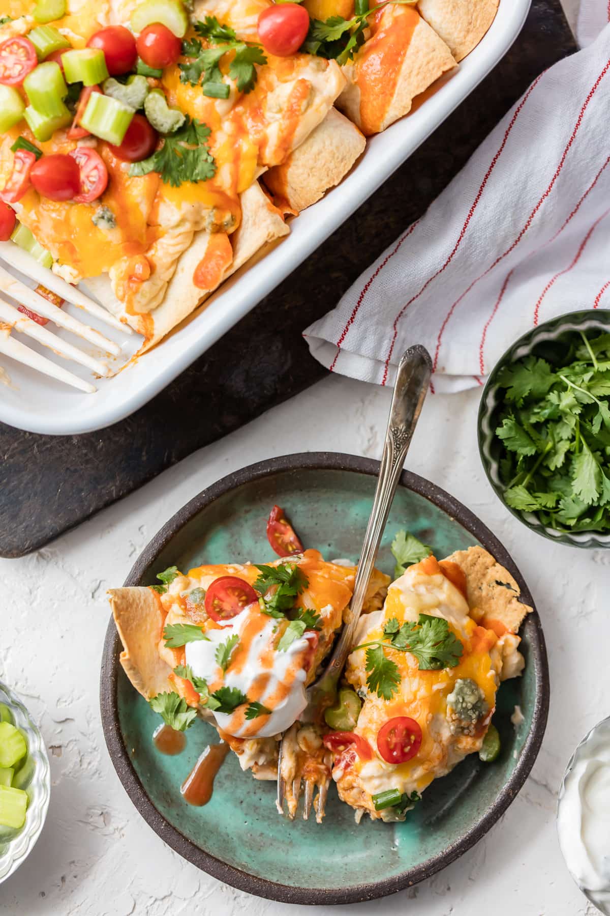 A plate of creamy chicken enchiladas