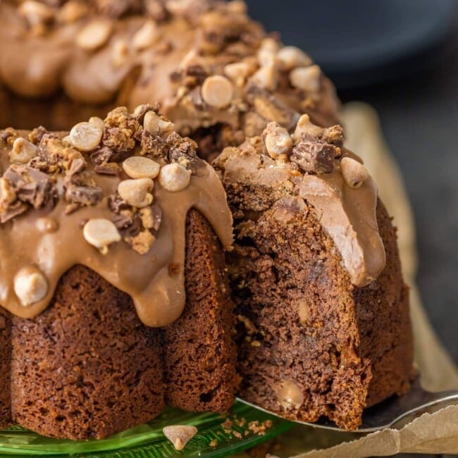 chocolate peanut butter cake being lifted with a spatula