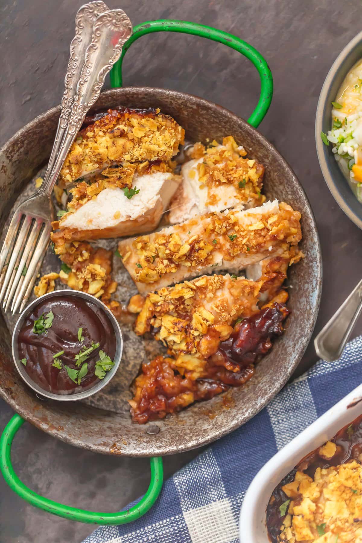 A plate of baked bbq chicken cut into strips