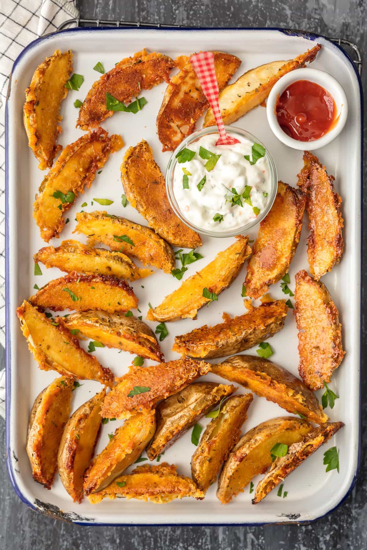 Parmesan Potato Wedges on a baking tray