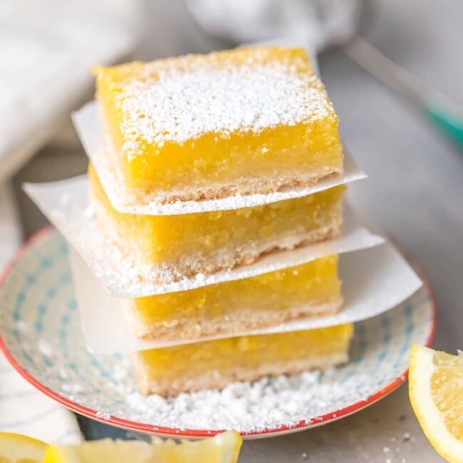 These GLUTEN FREE LEMON BARS are the easiest and best lemon bar recipe, and they just so happen to be gluten free! SO DELICIOUS! Thick and creamy lemon squares for the win.