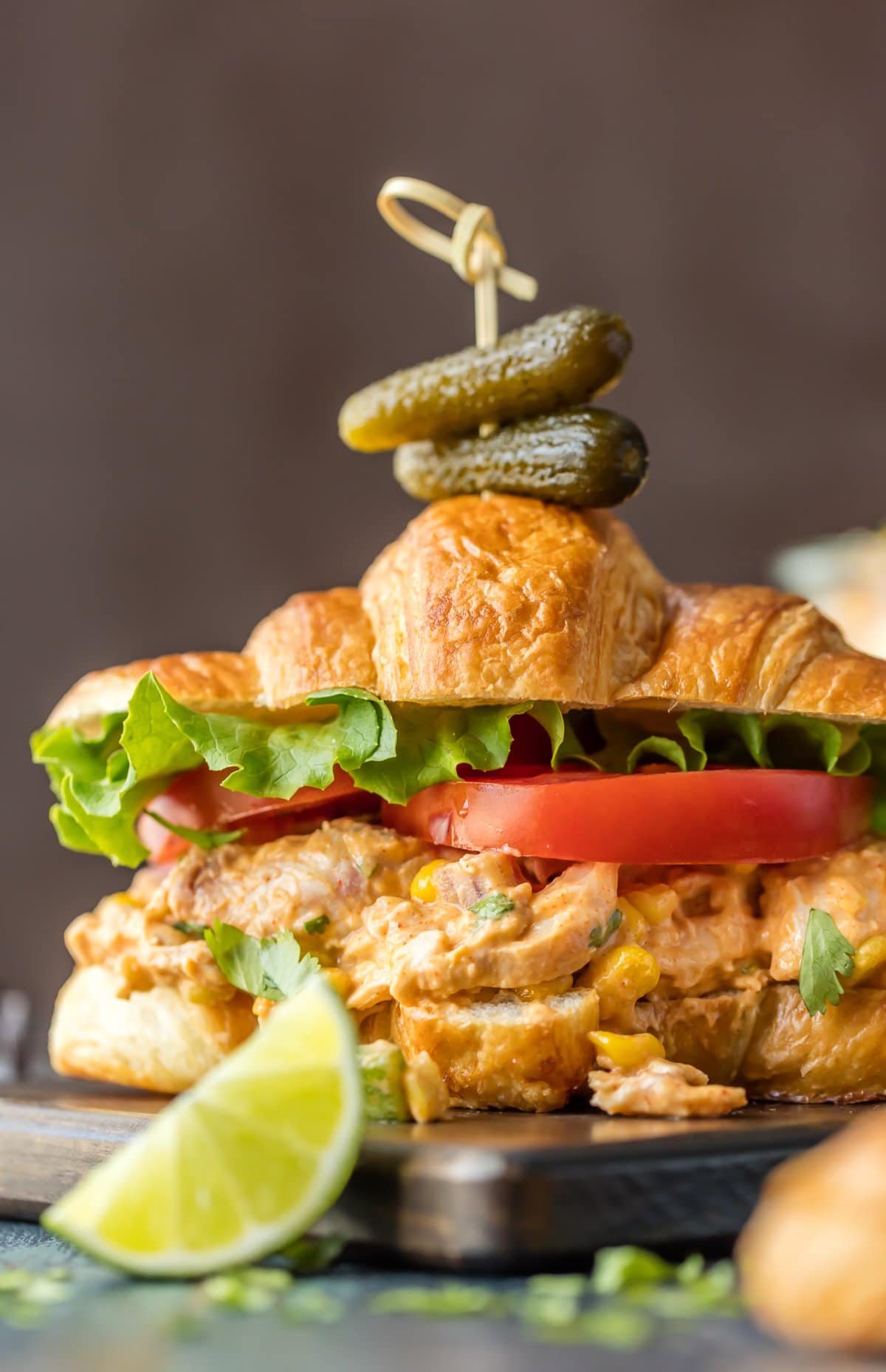 Chicken Salad Sandwich on a croissant with lettuce and tomato