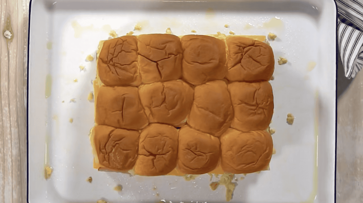 breakfast sliders on a baking sheet.