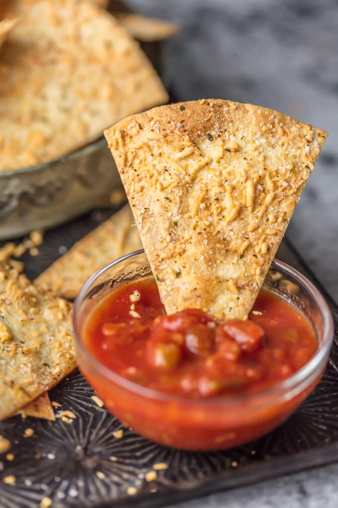 tortilla chip dipped into salsa