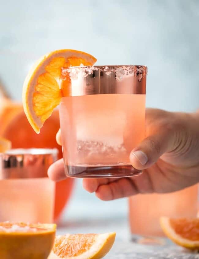 SALTY DOG SANGRIA is the ultimate refreshing Summer cocktail! Grapefruit vodka, juice, rose, club soda, and simple syrup come together in one refreshing and beautiful sip.