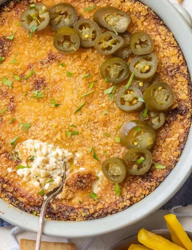 It doesn't get better than HOT JALAPENO POPPER DIP! A little bit spicy, a little bit creamy, and a whole lotta flavor. We love this dip for tailgating!