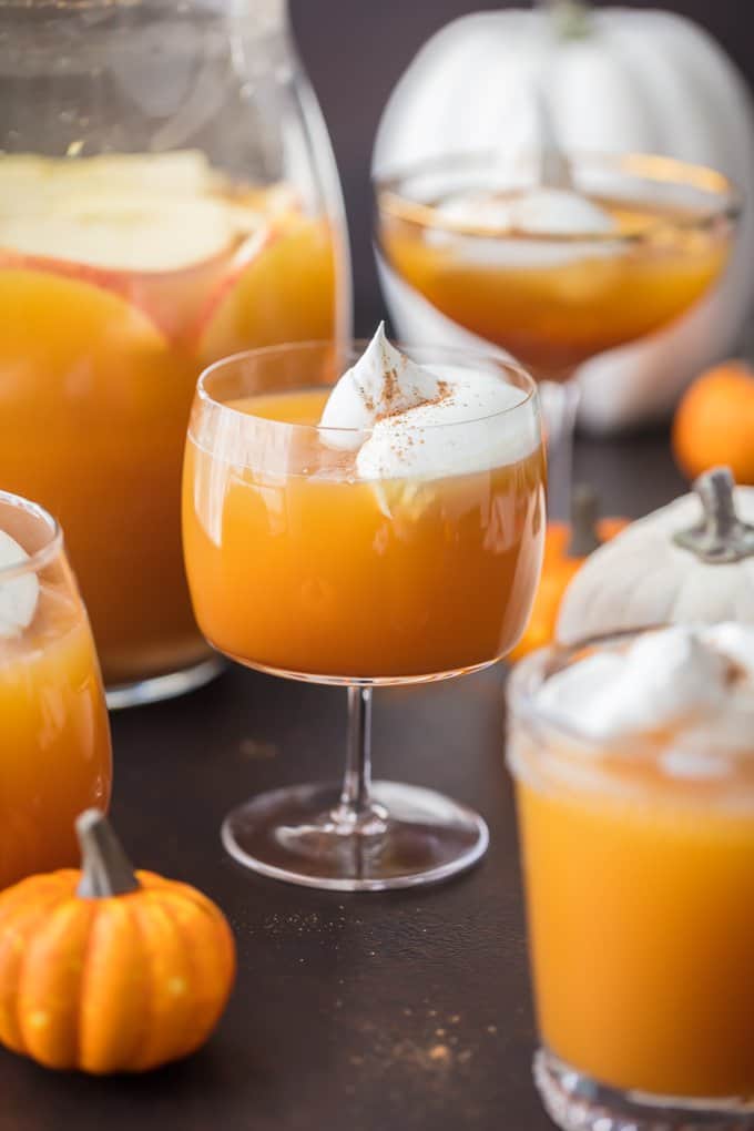 This Pumpkin Punch recipe is the perfect Thanksgiving or Halloween Punch idea. A fun & tasty Pumpkin Cocktail inspired by pumpkin pie!