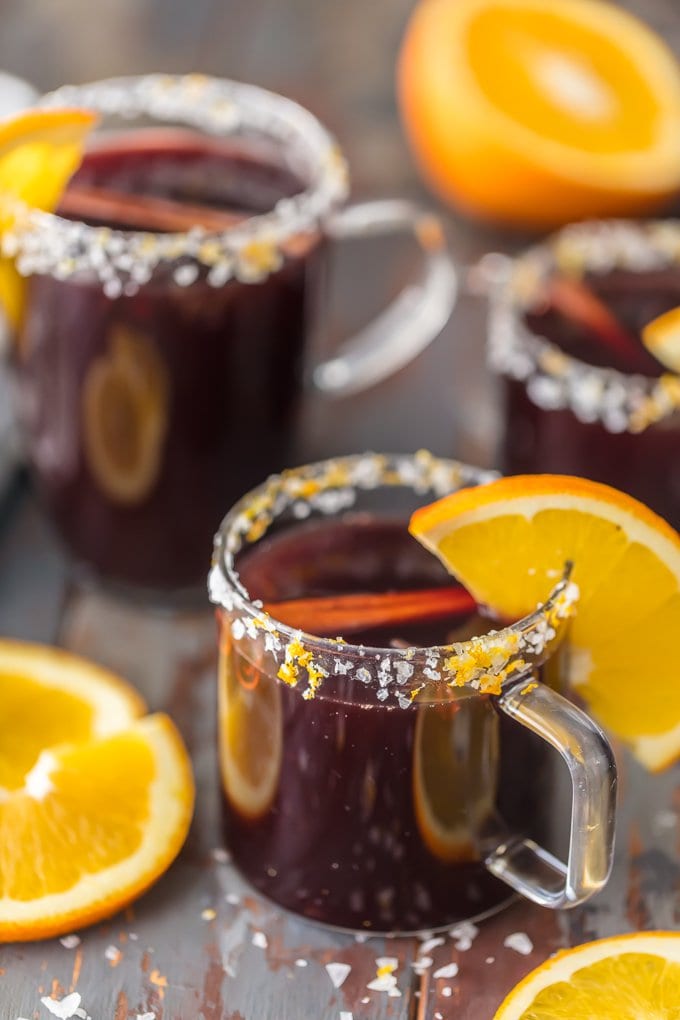 SPICED MULLED WINE MARGARITAS in clear cocktail glasses rimmed with sugared orange zest and orange slices