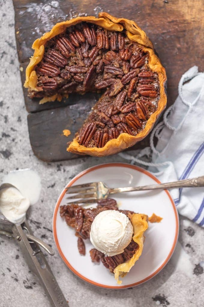 crock pot pecan pie next to a slice of pie