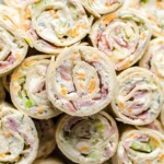 side view of several ham and cheese roll ups