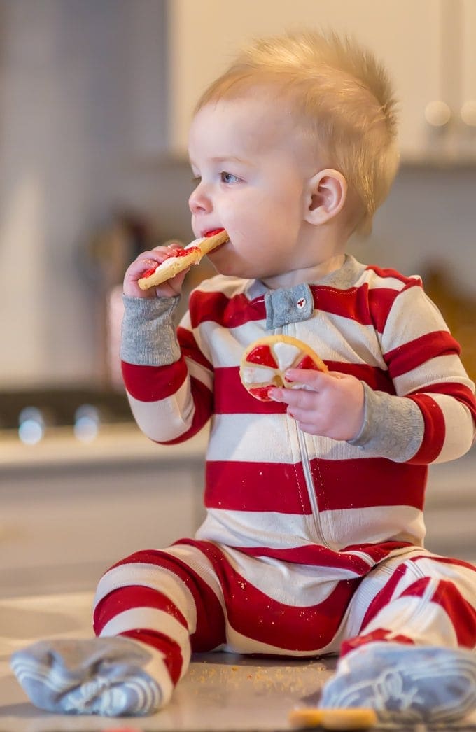 Cute baby eating the best sugar cookie recipe