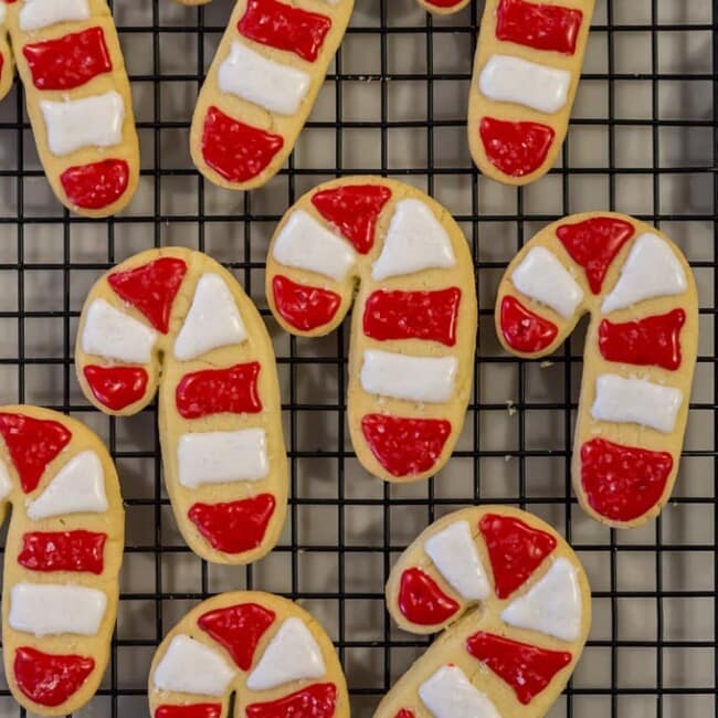 The BEST Sugar Cookie Recipe (aka Santa's favorite cookies) are soft sugar cutout cookies, festively decorated with sweet icing. This Easy  Sugar Cookie Recipe checks all the boxes! We call this easy sugar cookie recipe SANTA'S FAVORITE COOKIE RECIPE because it's simple, classic, fluffy, and delicious. We love to decorate them with the kids to leave under the tree for Santa. 