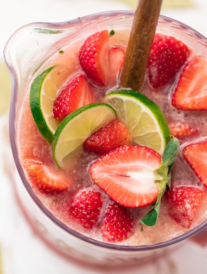 close up view looking into the top of a pitcher of sparkling margarita punch