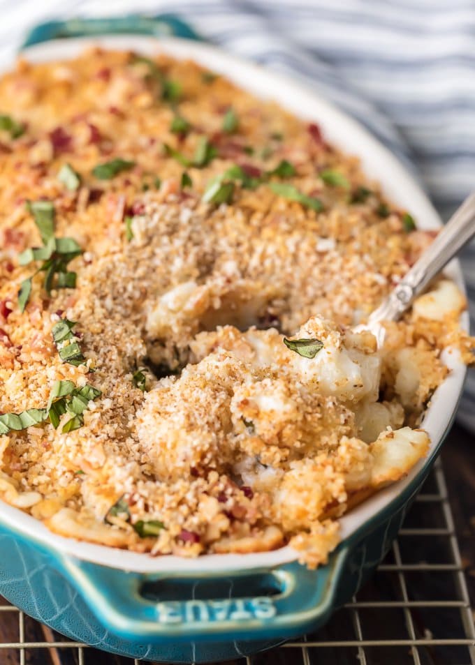 Cheesy Bacon Gnocchi Bake being scooped with a spoon