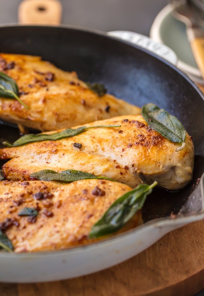 Brine Chicken Breast with crispy sage leaves in pan