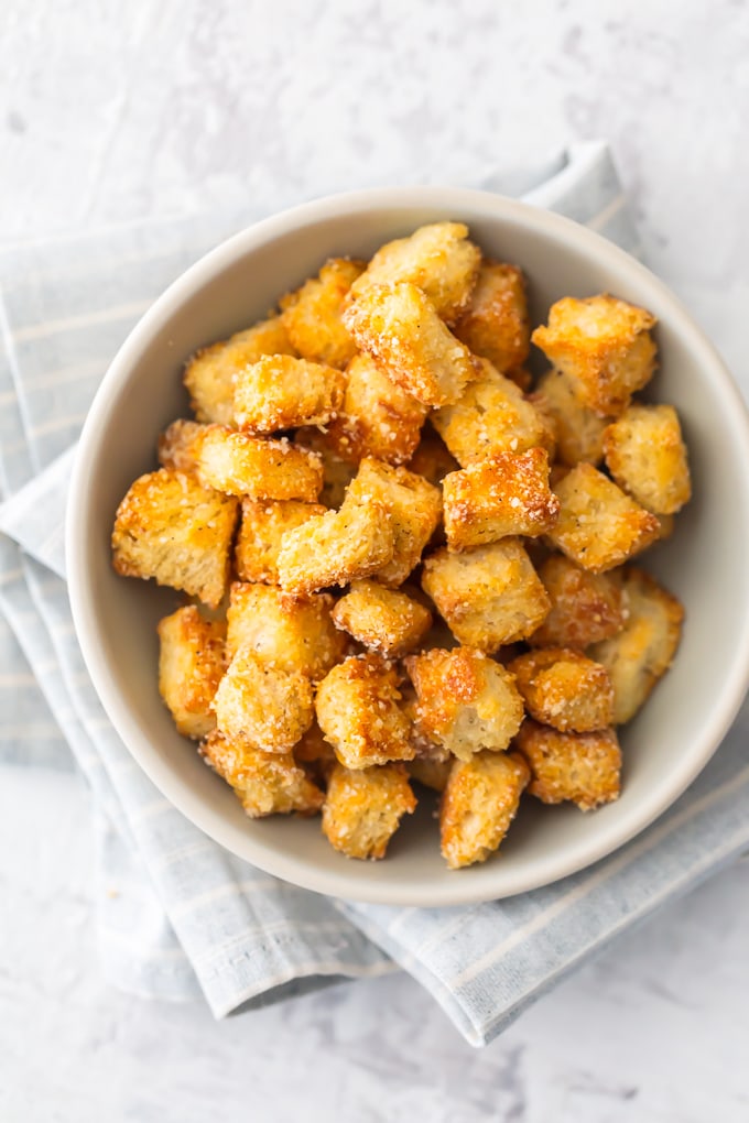 Homemade croutons in a white bowl