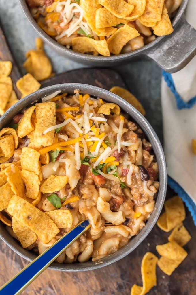 instant pot chili mac in bowls topped with fritos