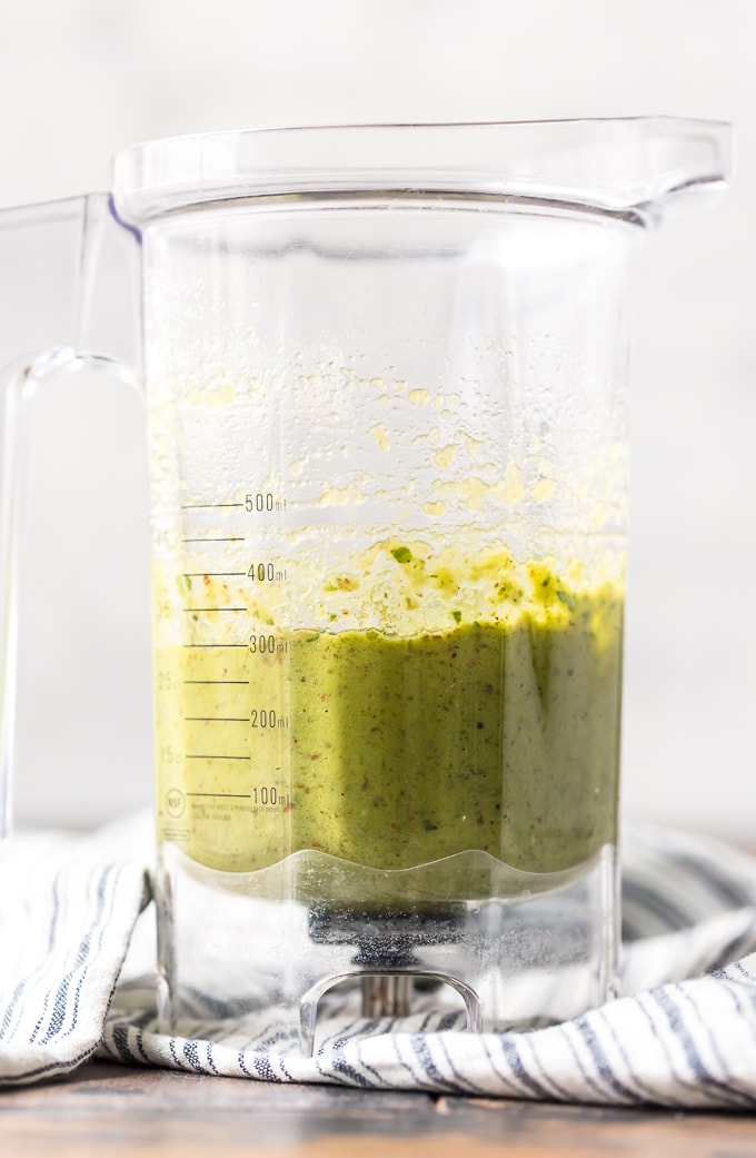 Homemade pesto sauce in a blender