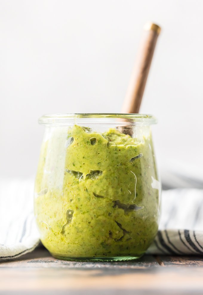 A jar of walnut basil pesto sauce