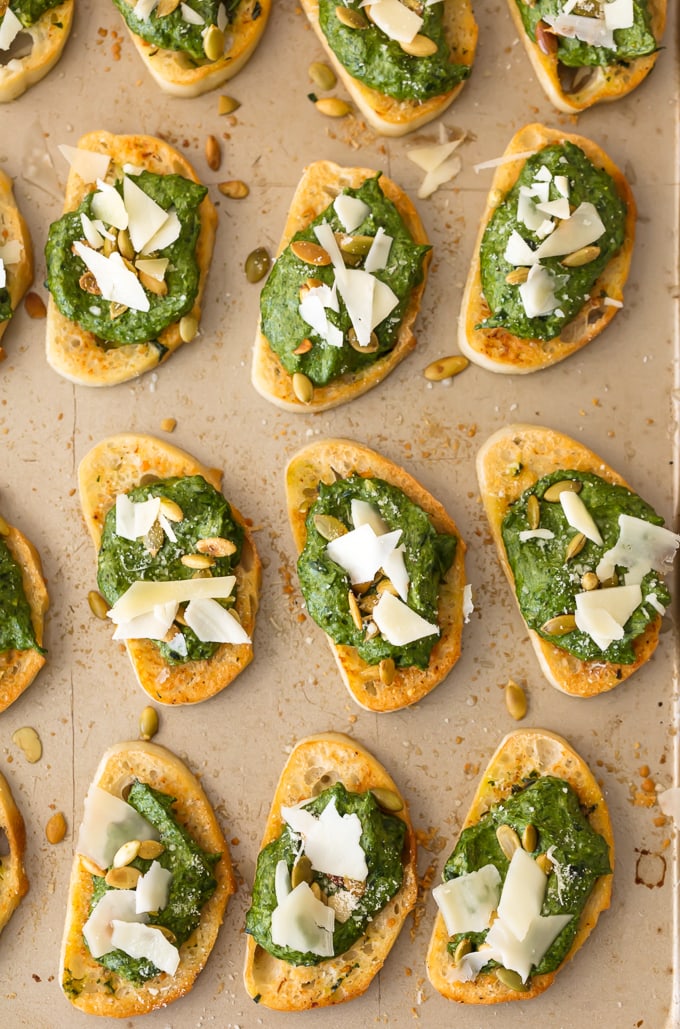 spinach dip crostinis lined up 