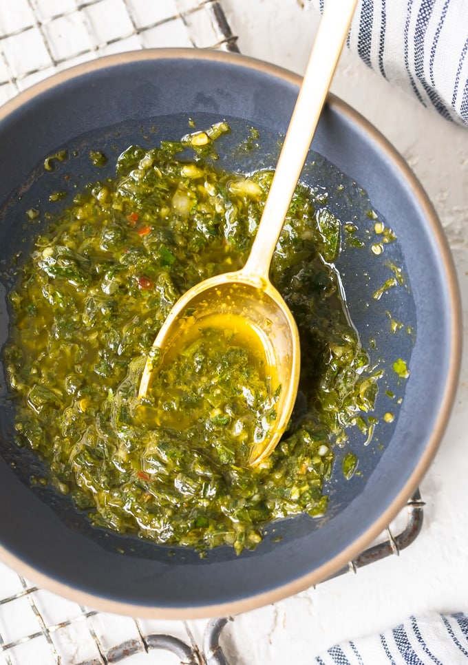 Green Chimichurri sauce in a blue bowl