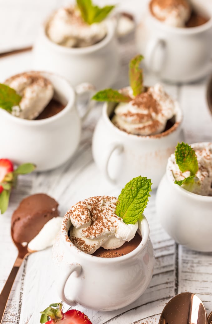 chocolate pots de creme arranged on a table