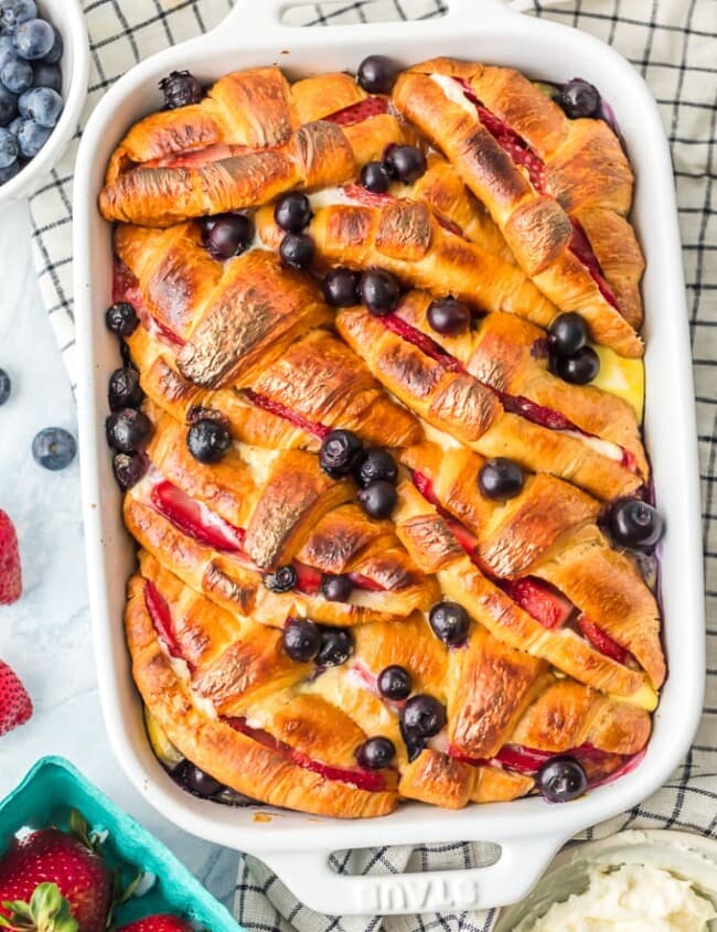 croissant french toast casserole in a white dish