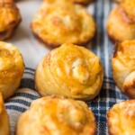 Garlic Cheese Bread Roll Ups are a fun and cheesy recipe that you can serve with any meal. These little garlic rolls are easy to make and so darn delicious!