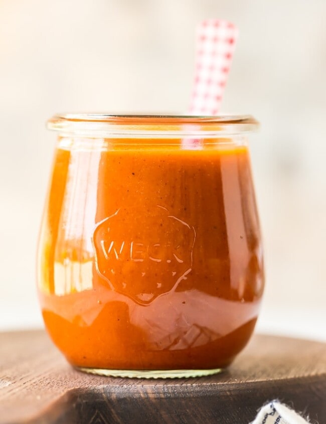 A close up of a glass of buffalo sauce