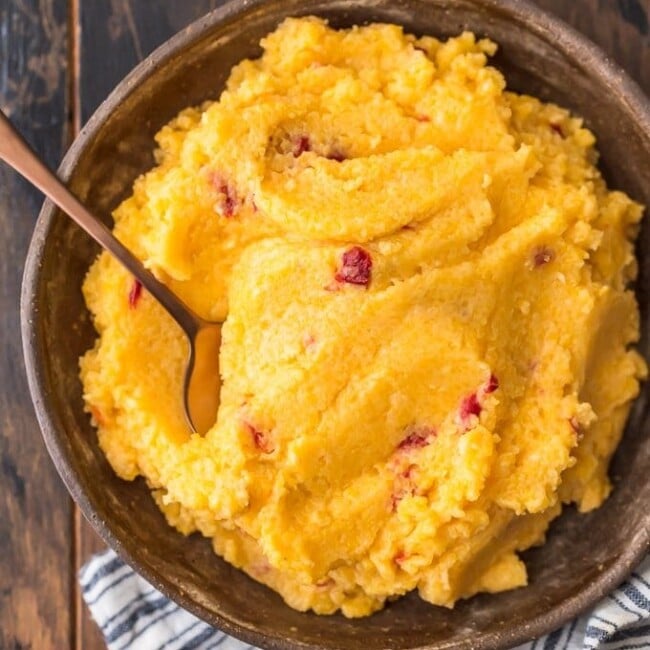 Cheese Grits are a classic Southern staple perfect for a quick breakfast, snack, or side dish. I combined them with another staple to create this delicious Pimento Cheese Grits recipe! They're cheesy, creamy, and oh so tasty. Eat them on their own on pair them with pork or chicken. You're going to love these easy cheese grits!